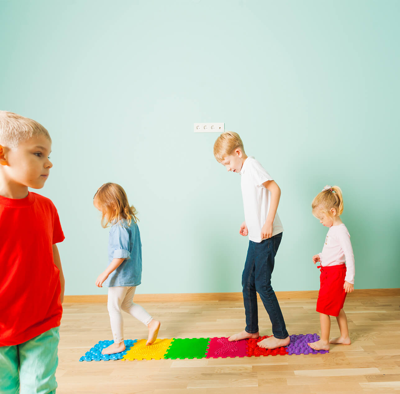 illustration of children playing together with a toy at mindful sprouts