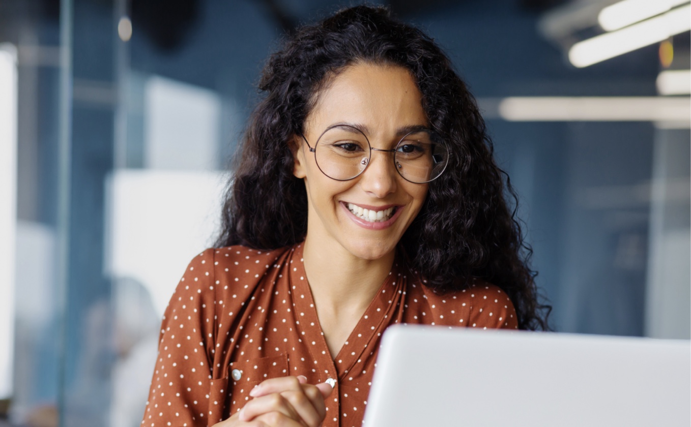 Woman Smiling with Laptop