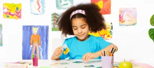 Child practicing ABA therapy activities with picture cards to build learning skills.