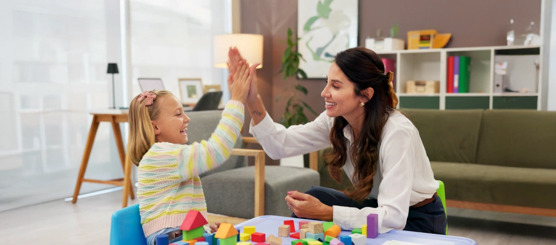 BCBA working with a child during ABA therapy session in Florida demonstrating how to become a BCBA in Florida through supervised practice