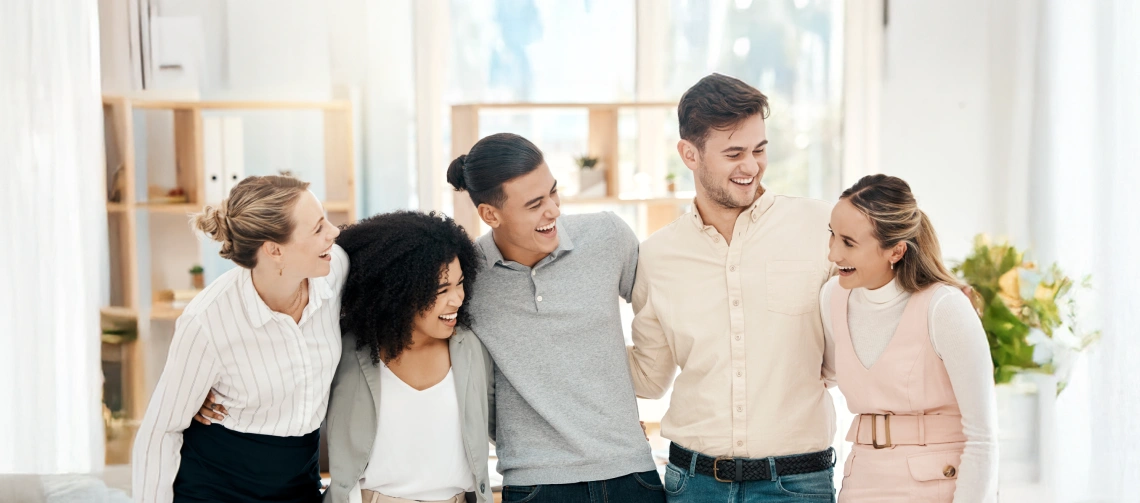 ABA therapy jobs at Mindful Sprouts team members smiling together in a supportive workplace culture.