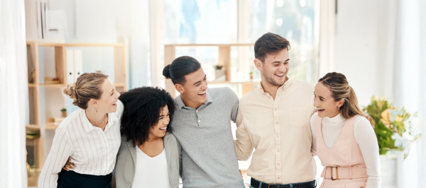 ABA therapy jobs at Mindful Sprouts team members smiling together in a supportive workplace culture.