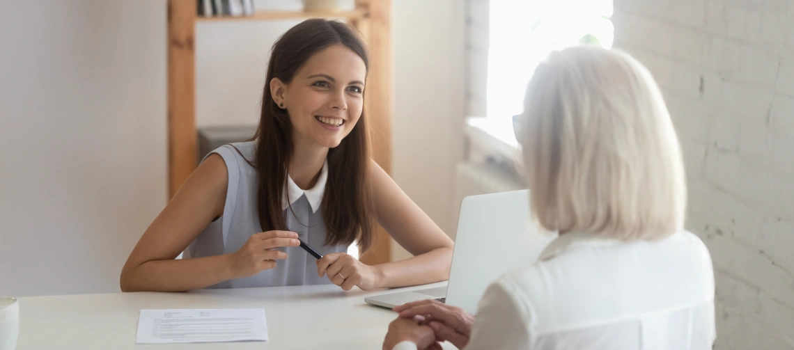 Candidate confidently discussing rbt interview questions during an in-person job interview
