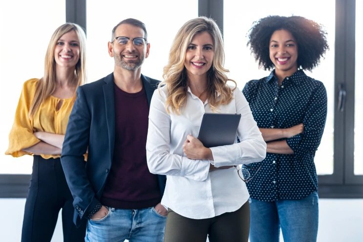 Is BCBA a good career? Diverse ABA professionals smiling in a clinic office setting.